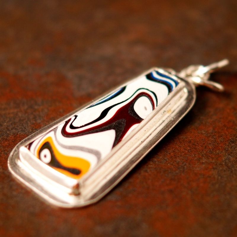 Contemporary handcrafted recycled sterling silver Trapeziod Jeep Fordite pendant